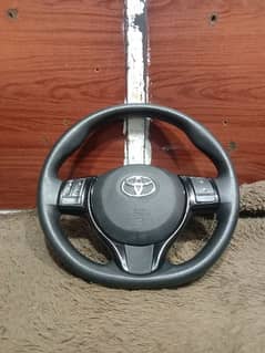 Toyota Vitz steering wheel multimedia 0