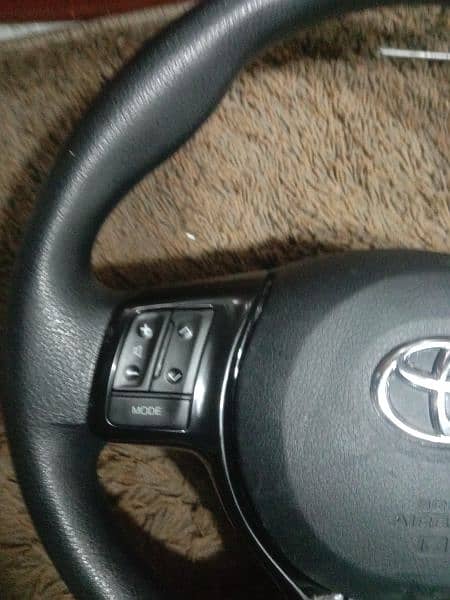 Toyota Vitz steering wheel multimedia 2