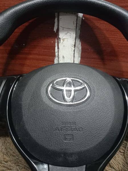 Toyota Vitz steering wheel multimedia 4