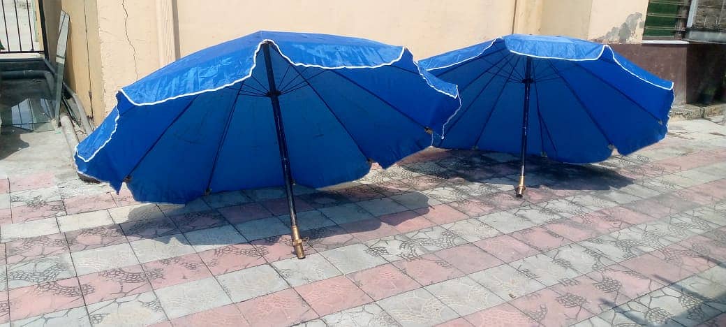 Two lawn Umbrellas Selling cheap 4