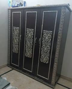 3 door wooden cupboard