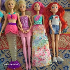 Orignal barbie and disney dolls