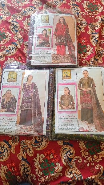 Three Piece Swiss Lawn suits in many Designs for sale. 6