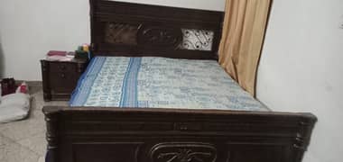 Wood double bed with spring mattres 0