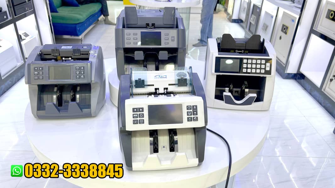 newwave cash counting,note,bill,packet  machine, safe locker pakistan 19