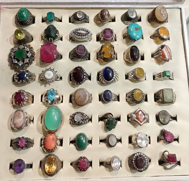 Natural stone rings and gemstones and products made of natural stones. 2