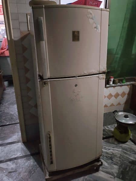 low cost, gas newly filled , working  fridge 0