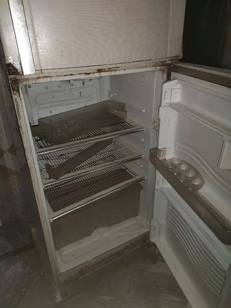 low cost, gas newly filled , working  fridge 3