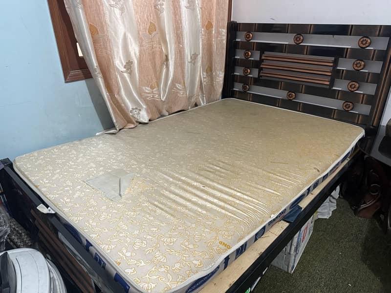 Iron bed with mattress 0