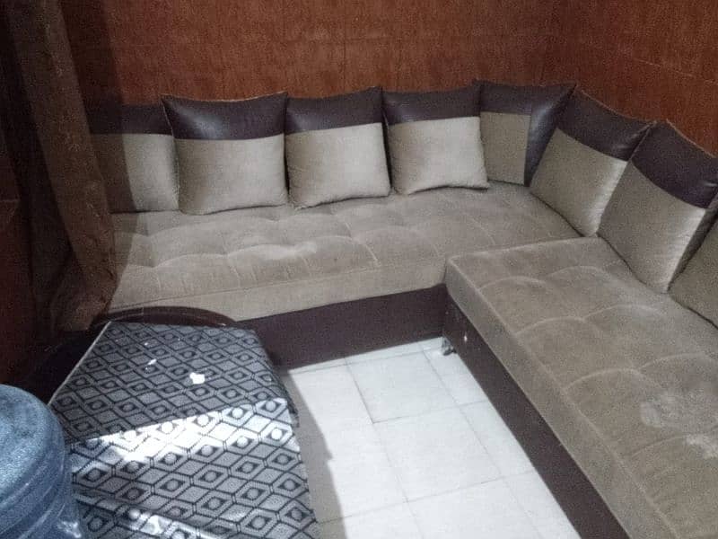 l shaped sofa or water dispenser urgent for sale 0