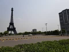 5 Marla 2 Sides Open Corner Possession Utilities Facing Eiffel Tower Commercial Plot at Builder Location Is For Sale in Quaid Block Bahria Town Lahore 0