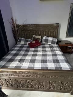 wooden bed with side tables 0