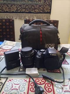 Canon 600D Body,kit lens,Charger, battery,bag Read description