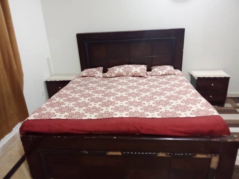 wooden bed  with 2 side  tables and mattress 2