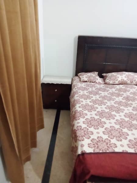 wooden bed  with 2 side  tables and mattress 3