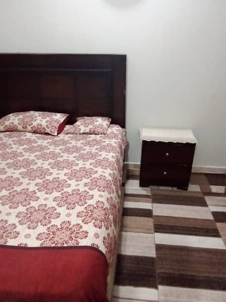 wooden bed  with 2 side  tables and mattress 4