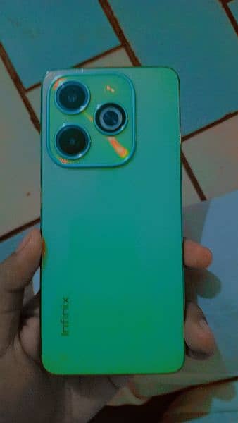 infinix hot 40i.  10 by 10  8+8 like new 3 month use comolete saman 1