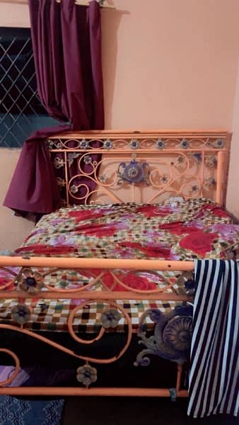 urgent sale iron bed with mettress 10/08 condition 0