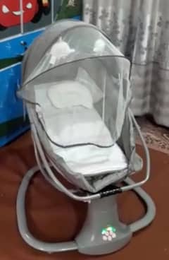 Battery operated kids swing