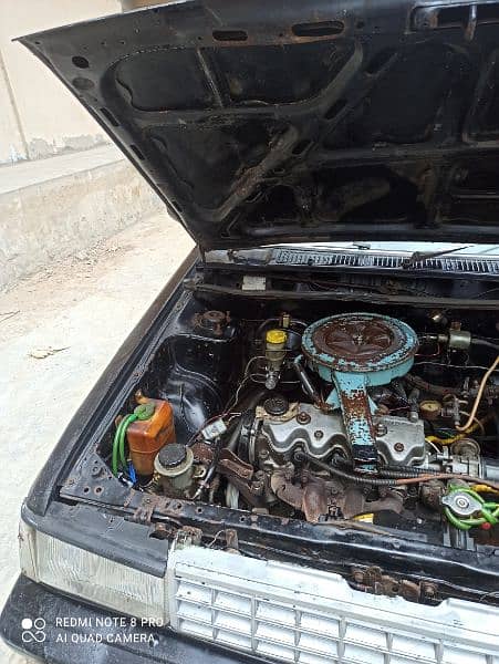 Nissan Sunny 1984 CNG petrol amplifier woofer 7