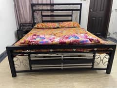 iron bed with mattress or side tables