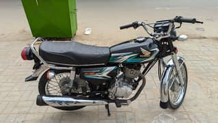 Honda CG 125 2023 Karachi number genuine condition Sealed engine 0