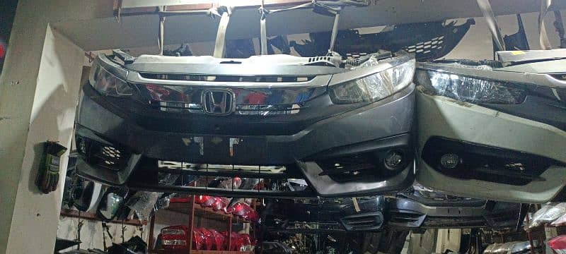 Honda City,Civic Head Lights,Bonnets,Grills,Fenders,Side Mirrors 2