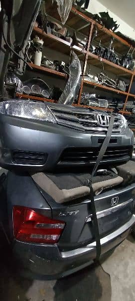 Honda City,Civic Head Lights,Bonnets,Grills,Fenders,Side Mirrors 17