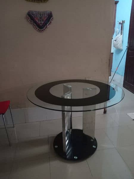 round glass table with two chairs 1