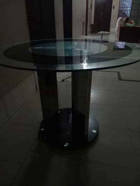 round glass table with two chairs 2