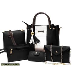 Handbag with good quality it's consists on 5 pieces.