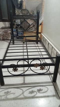 iron single bed in good condition 0