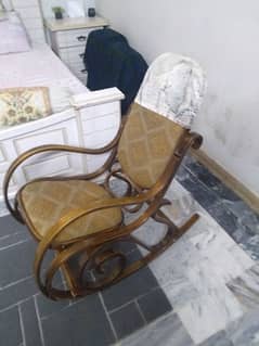 brown color rocking chair new bought from dubia 0