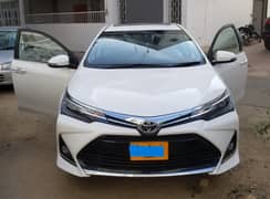 Toyota Altis Grande White 2021 with black interior. Slightly used car. 0