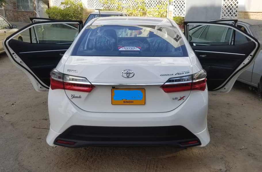 Toyota Altis Grande White 2021 with black interior. Slightly used car. 3