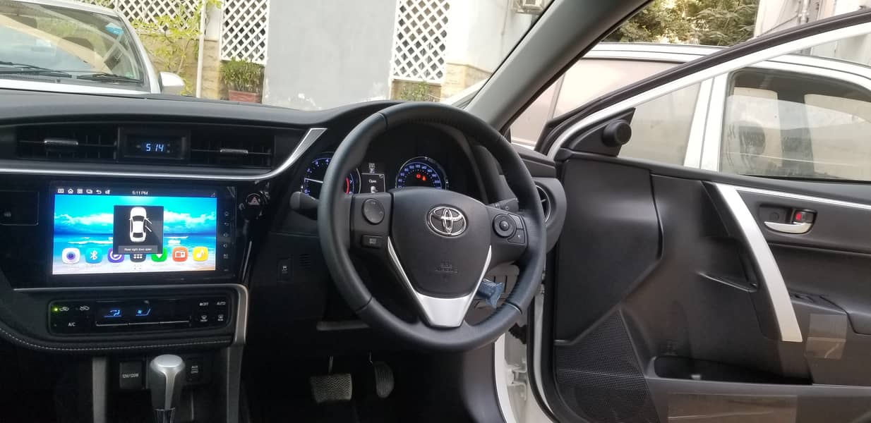 Toyota Altis Grande White 2021 with black interior. Slightly used car. 4