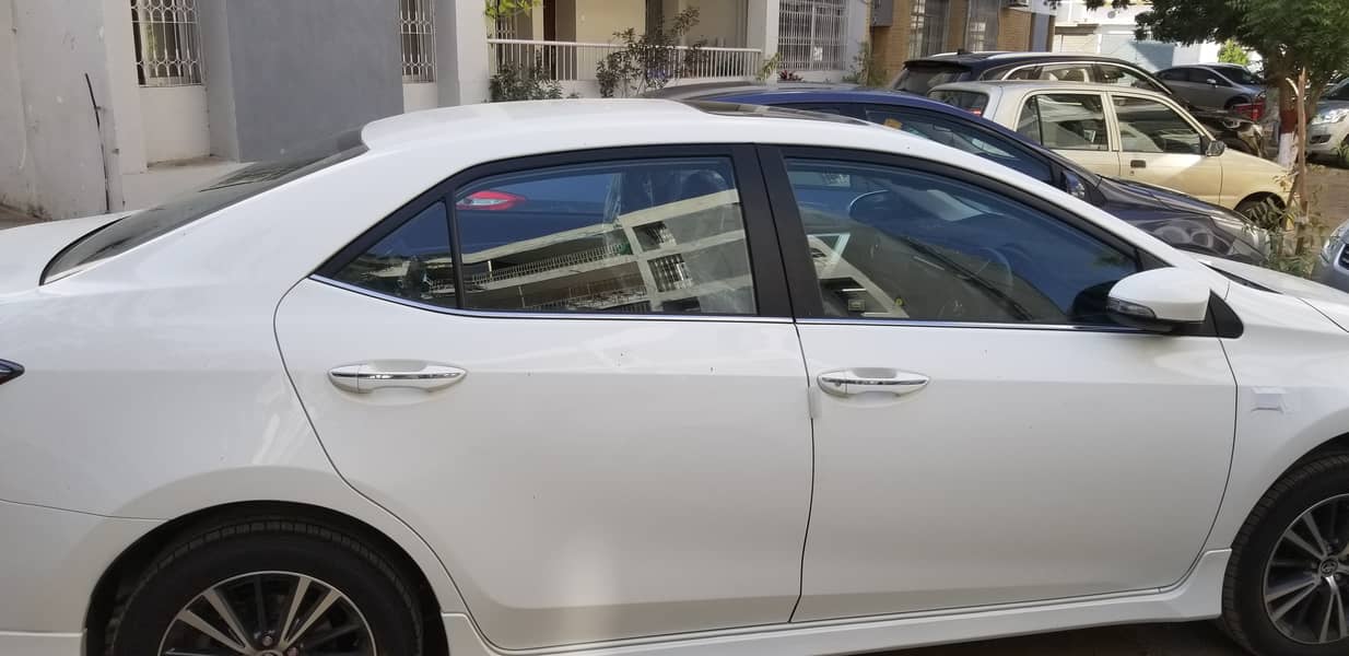 Toyota Altis Grande White 2021 with black interior. Slightly used car. 9