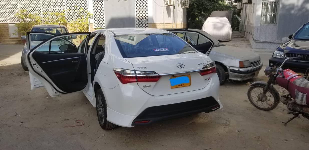 Toyota Altis Grande White 2021 with black interior. Slightly used car. 10