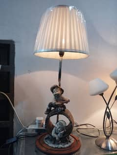 statue lamp. . made in Italy