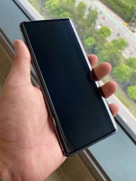 Infinix note 40 pro magpower / iPhone 11 Pro 0