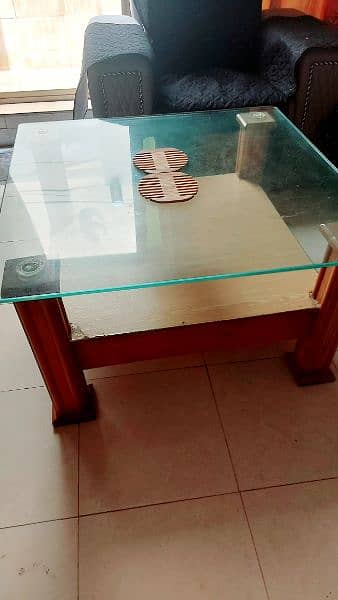 center table double-layered with 12 mm glass on top. 4