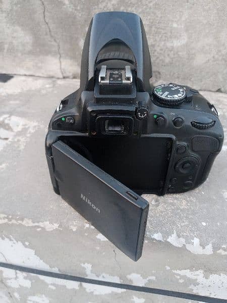 nikon d5100 flip screen auto vifeo+phto mic. optin price kum nhi honi 1