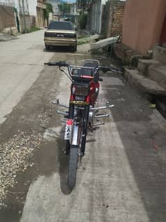 Honda 125 model 2023 red colar