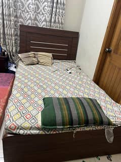 Slightly used 2 two single bed with mattresses 0