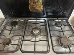 cooking range with five stoves in best condition. 0