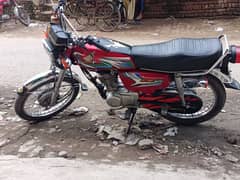 Honda 125 in lush condition