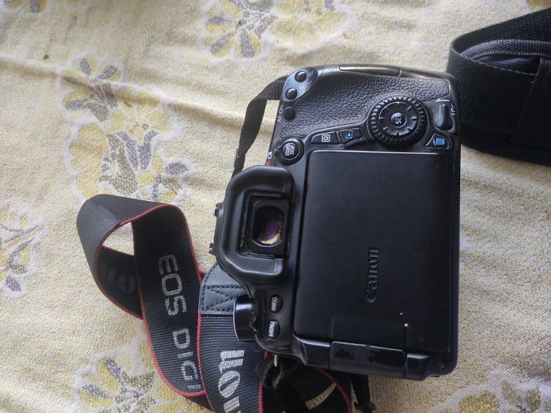 Canon 70d with (battery , bag , charger , 50mm lens ) 1