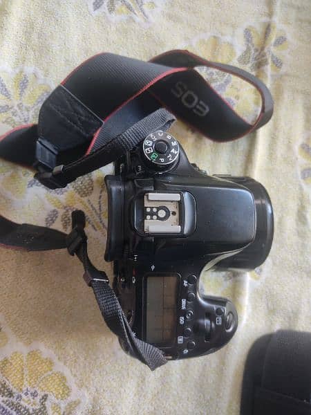 Canon 70d with (battery , bag , charger , 50mm lens ) 4