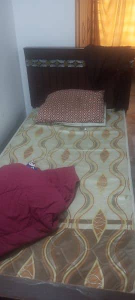 2single bed for sale in brown colour 2