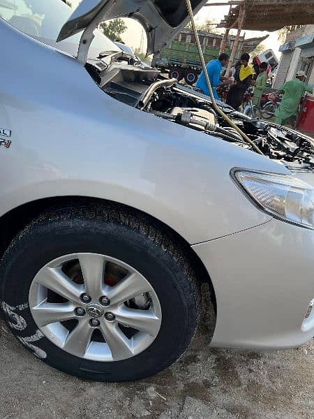 Toyota Corolla Altis 2009 almost Genuine 2 peace minor touchup. 12